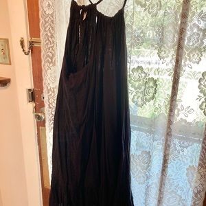 Black sleeveless cotton dress, ruffle bottom